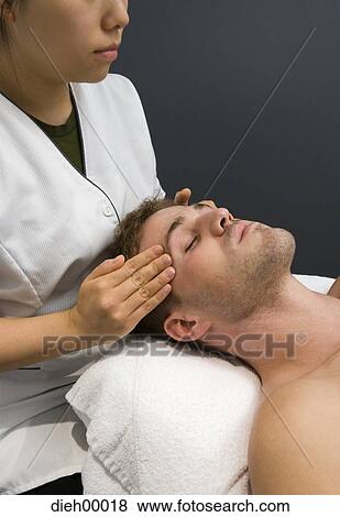 Stock Photo - Man having a massage. Fotosearch