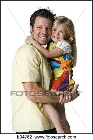 Stock Image - Man holding girl. Fotosearch