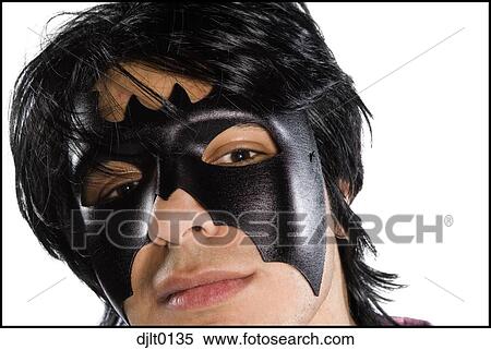 Stock Photography - Man in bat mask. Fotosearch