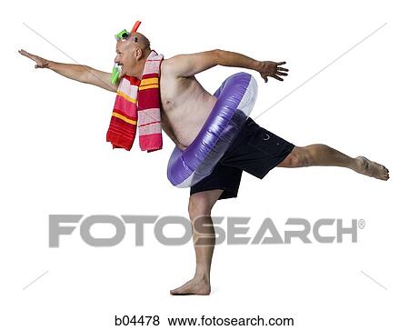 Man in diving mask with swimming ring View Large Photo Image Stock Photo - Man in diving mask with swimming ring. Fotosearch