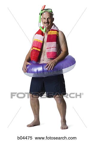 Man in diving mask with swimming ring View Large Photo Image Stock Photography - Man in diving mask with swimming ring. Fotosearch