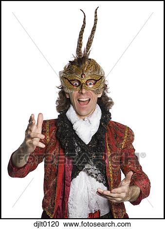 Man in elaborate costume with mask View Large Photo Image Stock Image - Man in elaborate costume with mask. Fotosearch