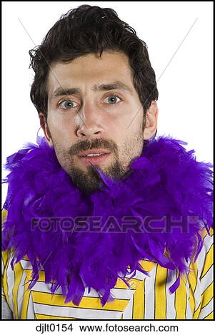 Picture - Man in feather boa. Fotosearch