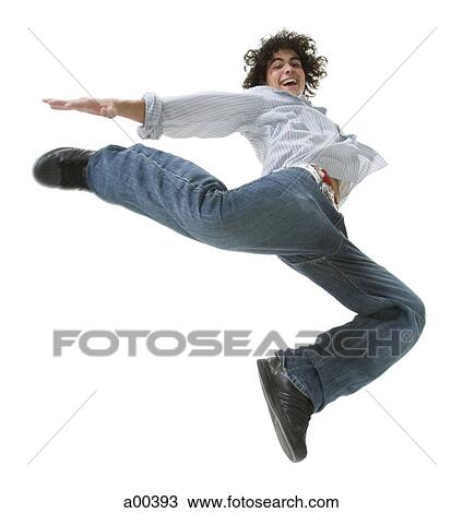 Man jumping and kicking View Large Photo Image Stock Image - Man jumping and kicking. Fotosearch