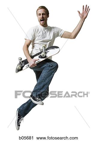 Stock Image - Man jumping with a skateboard. Fotosearch