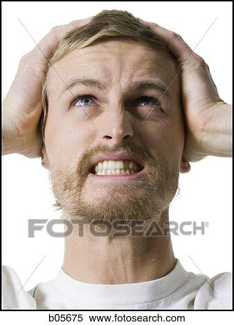 Stock Photography - Man looking frustrated. Fotosearch