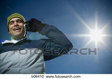 Man on a cell phone View Large Photo Image Stock Image - Man on a cell phone. Fotosearch