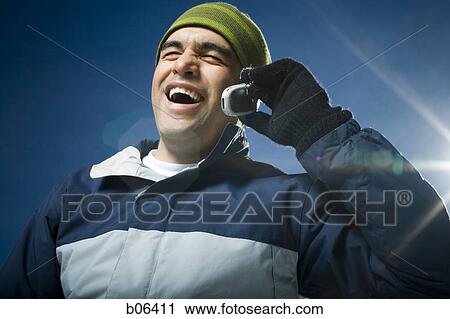Man on a cell phone View Large Photo Image Stock Image - Man on a cell phone. Fotosearch