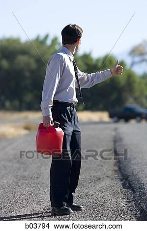 Man out of gas View Large Photo Image Picture - Man out of gas. Fotosearch