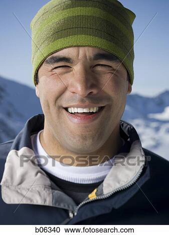 Stock Image - Man outside in the snow. Fotosearch