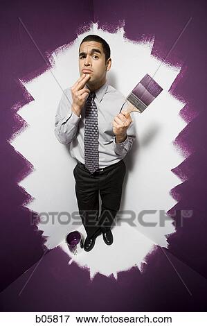 Man painted into a corner View Large Photo Image Stock Photo - Man painted into a corner. Fotosearch