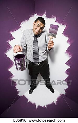 Man painted into a corner View Large Photo Image Stock Photograph - Man painted into a corner. Fotosearch