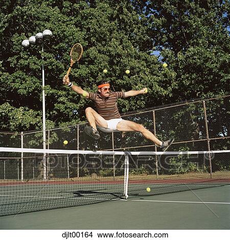 Picture - Man playing tennis. Fotosearch