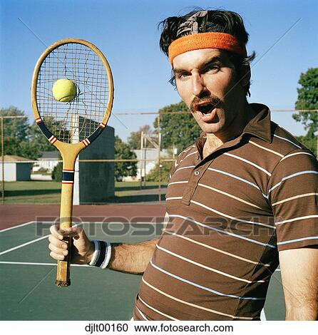 Man playing tennis View Large Photo Image Stock Image - Man playing tennis. Fotosearch