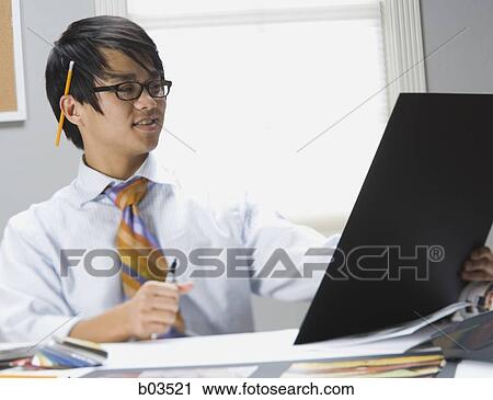 Man preparing for presentation View Large Photo Image Stock Image - Man preparing for presentation. Fotosearch
