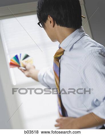 Man preparing for presentation View Large Photo Image Stock Photo - Man preparing for presentation. Fotosearch