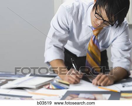 Man preparing for presentation View Large Photo Image Stock Photo - Man preparing for presentation. Fotosearch