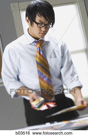 Man preparing for presentation View Large Photo Image Stock Photograph - Man preparing for presentation. Fotosearch