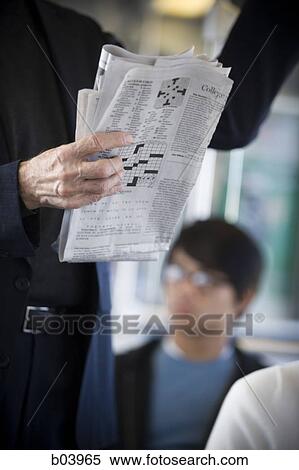 Man reading newspaper on city bus or subway View Large Photo Image Stock Photography - Man reading newspaper on city bus or subway. Fotosearch