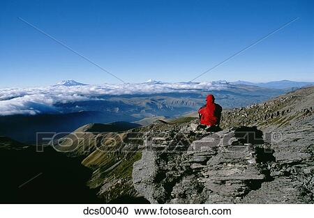 Man sitting on mountain View Large Photo Image Stock Image - Man sitting on mountain. Fotosearch