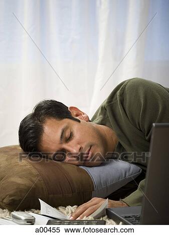 Man sleeping on cushion View Large Photo Image Stock Photography - Man sleeping on cushion. Fotosearch