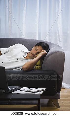 Man sleeping on sofa View Large Photo Image Stock Photography - Man sleeping on sofa. Fotosearch