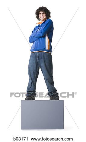 Man standing on a blank sign View Large Photo Image Stock Image - Man standing on a blank sign. Fotosearch
