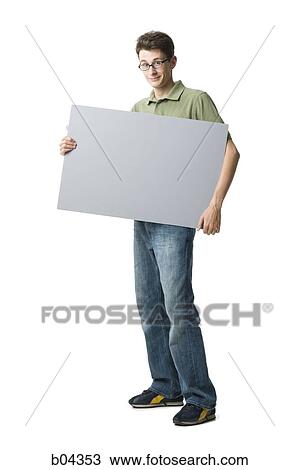 Man standing with blank sign View Large Photo Image Stock Image - Man standing with blank sign. Fotosearch