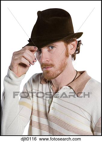 Man tipping his hat View Large Photo Image Stock Photograph - Man tipping his hat. Fotosearch