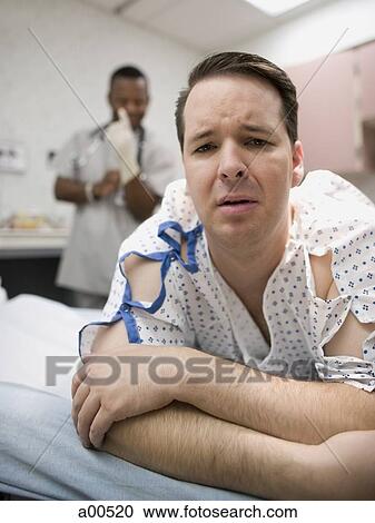 Man waiting for medical exam View Large Photo Image Stock Image - Man waiting for medical exam. Fotosearch