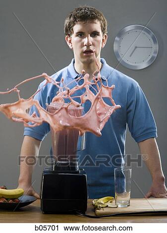 Stock Image - Man with a blender explosion. Fotosearch