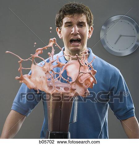Stock Image - Man with a blender explosion. Fotosearch