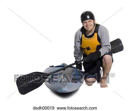 Man with a kayak View Large Photo Image Stock Photo - Man with a kayak. Fotosearch