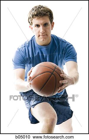 Man with basketball in motion View Large Photo Image Stock Image - Man with basketball in motion. Fotosearch