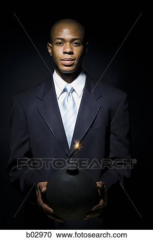 Stock Image - Man with bomb. Fotosearch