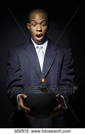 Stock Image - Man with bomb. Fotosearch