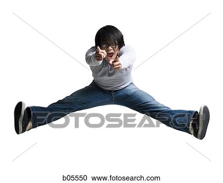 Man with eyeglasses leaping and pointing View Large Photo Image Stock Image - Man with eyeglasses leaping and pointing. Fotosearch