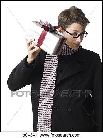 Man with gift box View Large Photo Image Stock Image - Man with gift box. Fotosearch