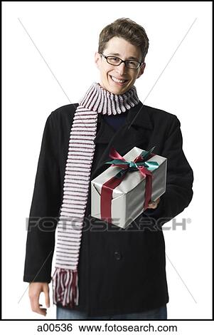 Stock Photograph - Man with gift box. Fotosearch