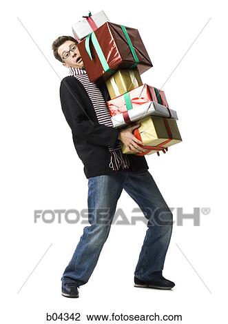 Stock Image - Man with gift boxes. Fotosearch