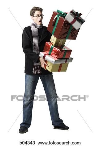 Stock Image - Man with gift boxes. Fotosearch