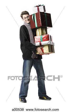 Man with gift boxes View Large Photo Image Stock Photo - Man with gift boxes. Fotosearch