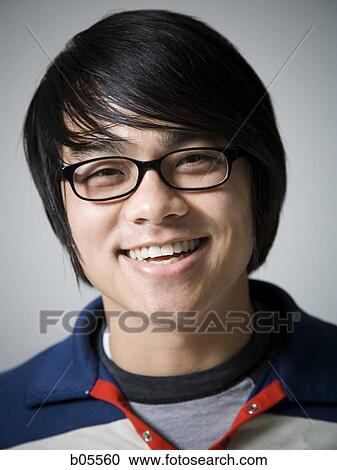 Man with glasses smiling View Large Photo Image Stock Image - Man with glasses smiling. Fotosearch