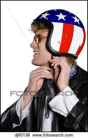 Stock Photo - Man with stars and stripes helmet. Fotosearch