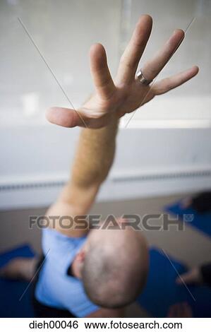 Man with stretched arm View Large Photo Image Stock Photograph - Man with stretched arm. Fotosearch