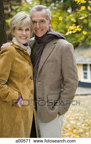 Mature couple outdoors View Large Photo Image Stock Image - Mature couple outdoors. Fotosearch