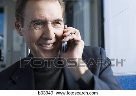 Mature man on cell phone View Large Photo Image Stock Photo - Mature man on cell phone. Fotosearch