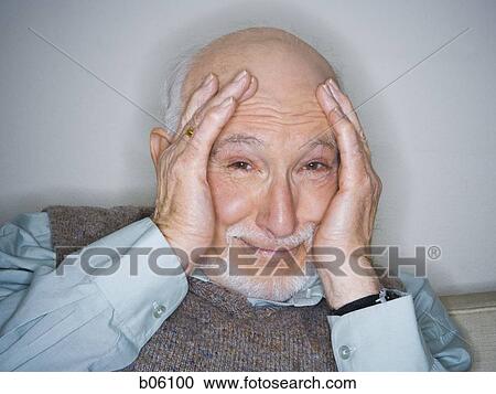 Mature man sitting on a couch View Large Photo Image Stock Image - Mature man sitting on a couch. Fotosearch
