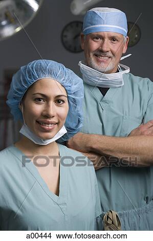 Medical personnel in operating room View Large Photo Image Picture - Medical personnel in operating room. Fotosearch