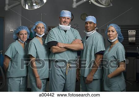 Medical personnel in operating room View Large Photo Image Stock Image - Medical personnel in operating room. Fotosearch